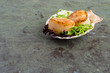 Freshly cooked scallops on a shell