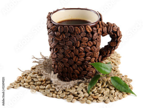 Obraz w ramie Cup of coffee beans and green beans isolated on white