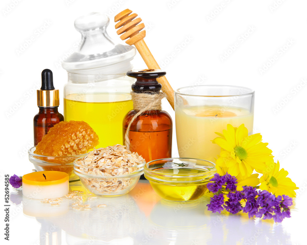 Fragrant honey spa with oils and honey isolated on white