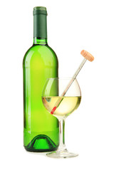 Bottle and glass of wine with thermometer, isolated on white