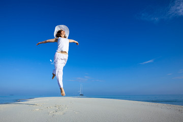 Sticker - Caucasian woman dancing at the sea