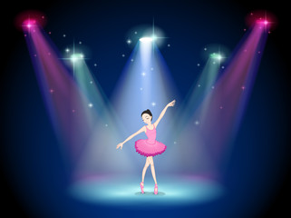 Poster - A graceful ballerina at the center of the stage