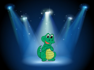 Poster - A young crocodile at the stage with spotlights