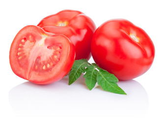 Wall Mural - Two Juicy Red tomatoes and half with leaves Isolated on white ba