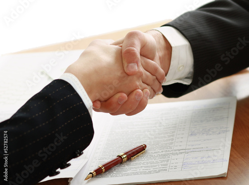 Naklejka ścienna Handshake of business partners