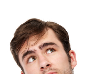 Portrait of a young man looking up