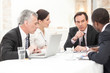© BlueSkyImages - Business People In Meeting
