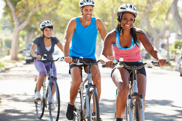 Poster - Group Of Cyclists On Suburban Street