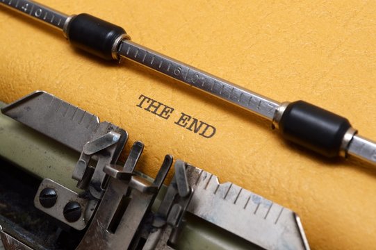 The end text on typewriter