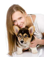 Wall Mural - dog and girl. looking at camera. isolated on white background