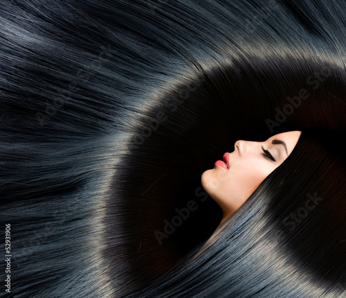 Fototapeta na wymiar Healthy Long Black Hair. Beauty Brunette Woman