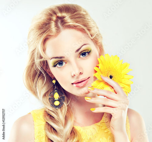 Naklejka dekoracyjna Beautiful model with yellow makeup.