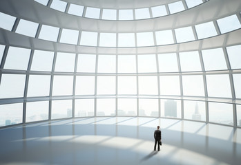 Wall Mural - man standing in big hall