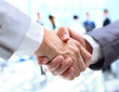 © ASDF - Closeup of a business handshake