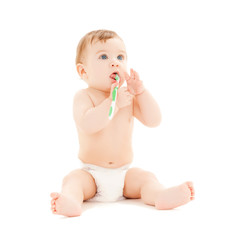 Canvas Print - curious baby brushing teeth