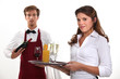 © auremar - Wine waiter and waitress, studio shot