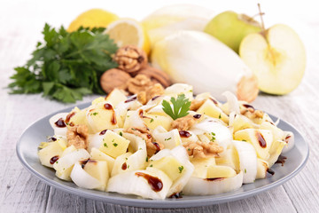Wall Mural - chicory salad with walnut and apple