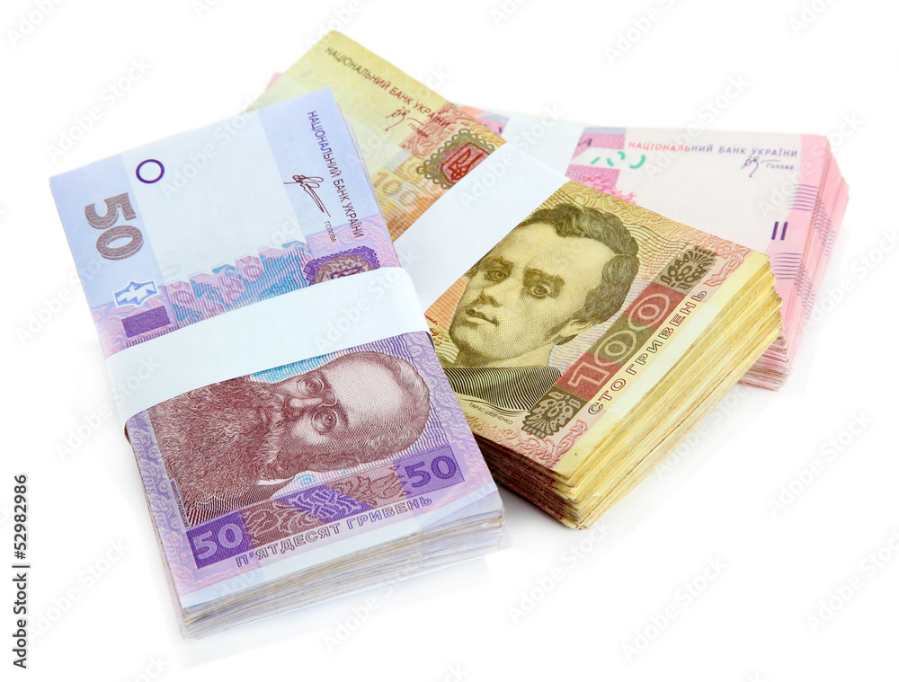 Pile of Ukrainian money, isolated on white