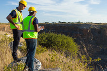 Surveyors Working At Mining Site