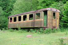 Old Railroad Car In The Woods