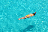 Fototapeta Do akwarium - Woman snorkeling