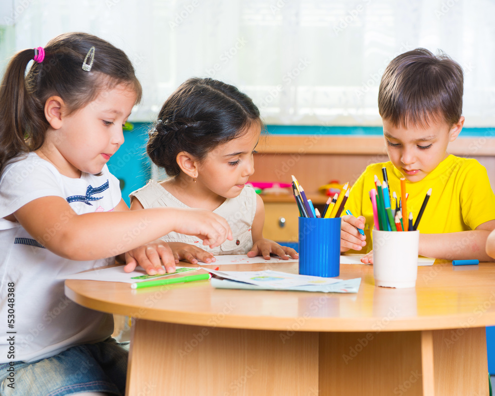Group of cute little prescool kids drawing Stock Photo | Adobe Stock