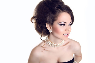 Canvas Print - Beautiful woman with  pearls and evening make-up isolated on whi