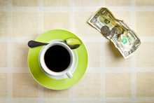 American Currency And Coffee Cup