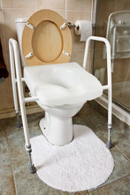 Adjustable Height Toilet Seat