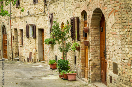 Naklejka dekoracyjna Vintage street decorated with flowers, Italy