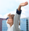 © ty - Portrait of cute young business woman outdoor with hands spread