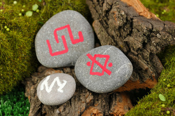 Wall Mural - Fortune telling  with symbols on stone close up