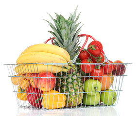 Canvas Print - Assortment of fresh fruits and vegetables in metal basket,