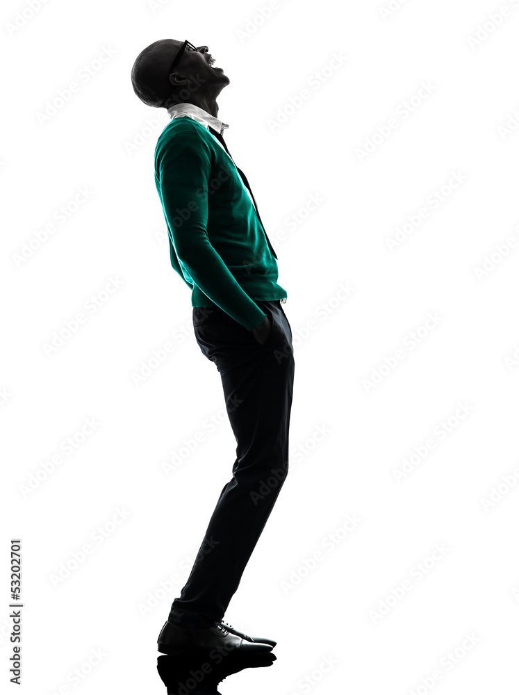african black man standing looking up laughing silhouette Stock Photo ...