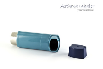 Asthma inhaler isolated on a white background.