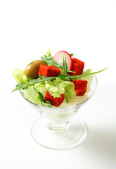 Wall Mural - Vegetable salad with green olives and cheese