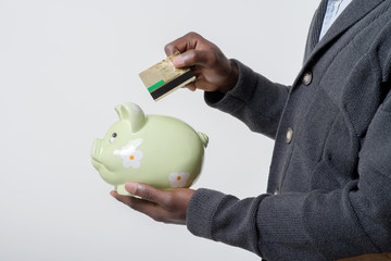 man holding a piggy bank