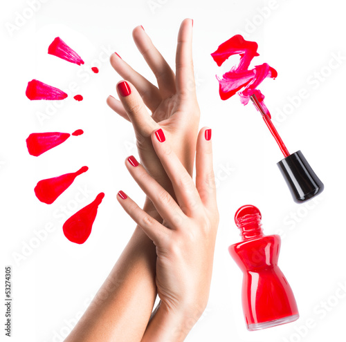 Naklejka nad blat kuchenny Beautiful female hands with red manicure