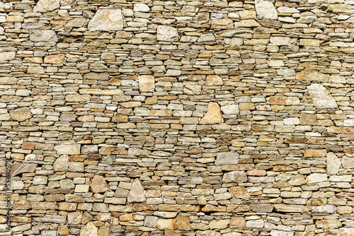 Naklejka nad blat kuchenny The wall of natural stone - natural background