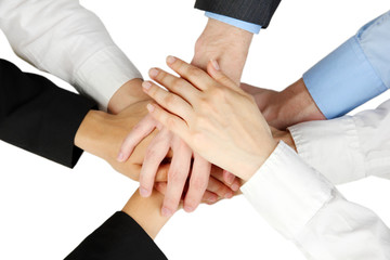 Group of young people's hands isolated on white