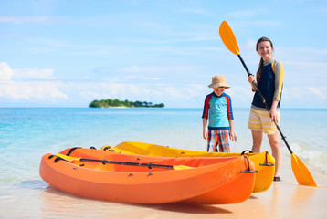 Canvas Print - Mother and son with kayaks