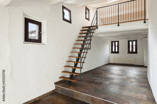 Nowoczesny obraz na płótnie interior rustic house, large room with staircase