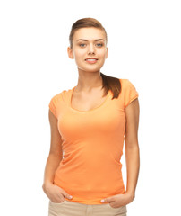 Wall Mural - smiling woman in blank color t-shirt