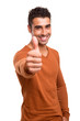 © Trendsetter Images - Smiling guy showing thumbs UP