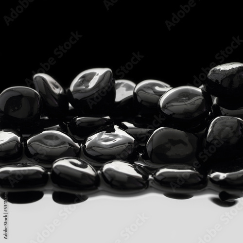 Fototapeta Black stones on calm water background