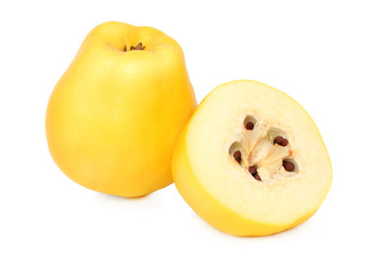 One whole and a half quince (isolated)