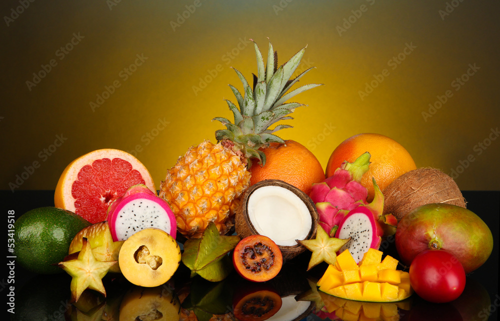Composition of exotic fruits on colorful background