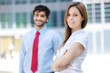 © Minerva Studio - Two businesspeople in an urban setting