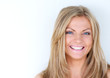 © mimagephotos - Portrait of a beautiful blond woman laughing