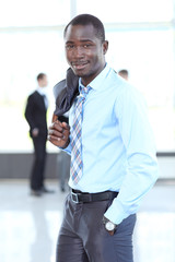 Wall Mural - Portrait of a handsome successful business man busy working